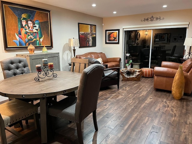 dining room with recessed lighting and dark wood-style floors