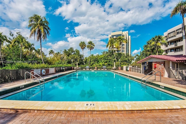 view of swimming pool featuring a patio