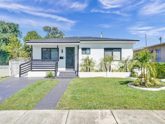 view of front of house with a front lawn