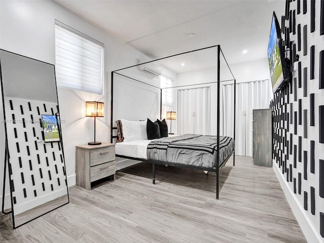 bedroom featuring light wood-type flooring