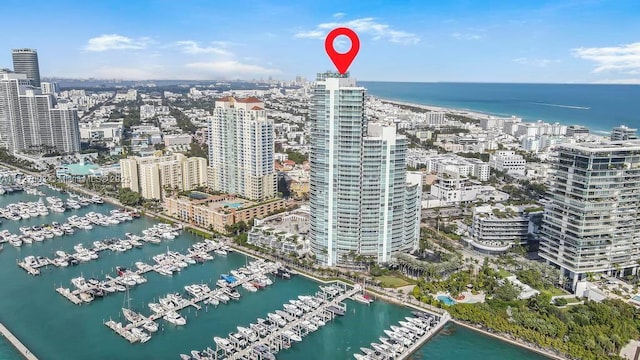 birds eye view of property featuring a water view