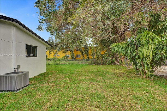 view of yard featuring central AC unit