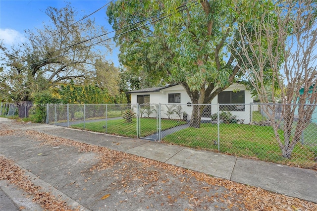 view of front of property with a front lawn