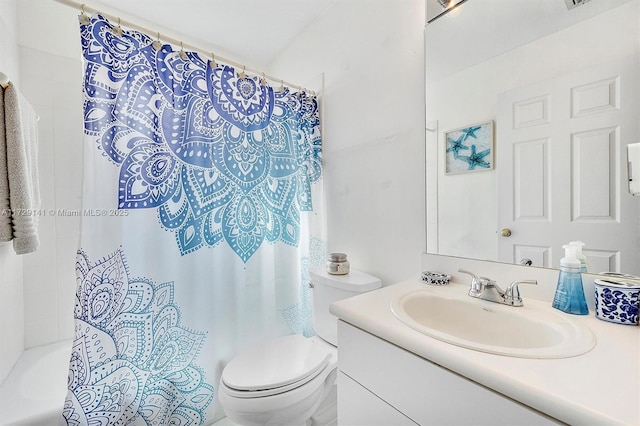 full bathroom featuring toilet, vanity, and shower / tub combo with curtain