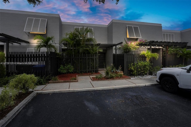 view of front of home featuring a pergola