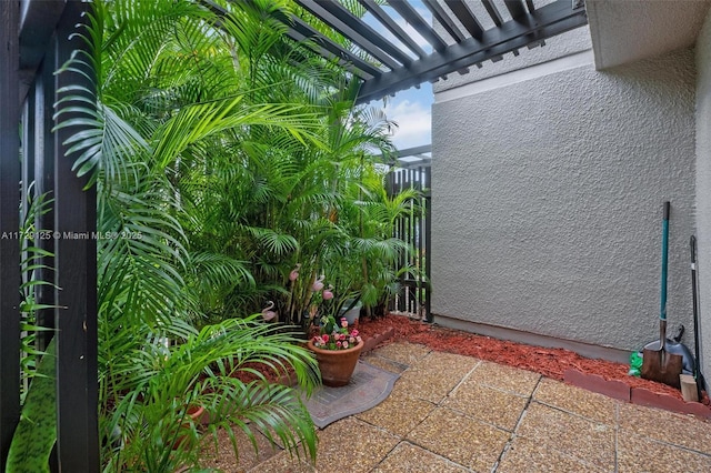 view of patio featuring a pergola