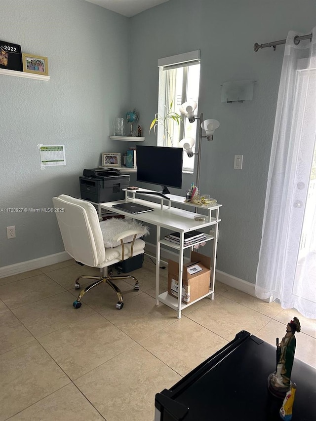 office with light tile patterned flooring