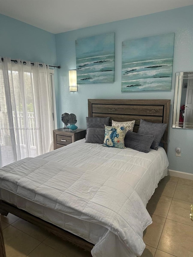 bedroom featuring tile patterned flooring