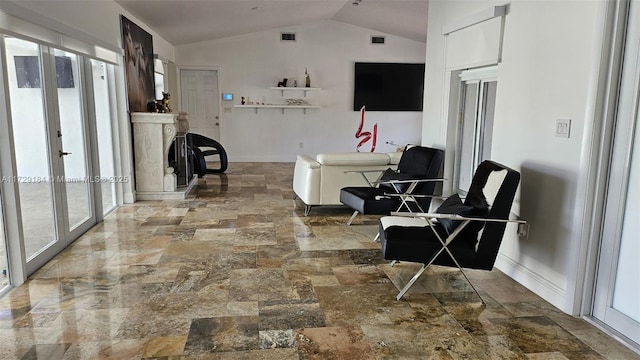 16400 SW 173rd Ave, Miami, FL 33187 - corridor with lofted ceiling, baseboards, stone finish floors, and french doors