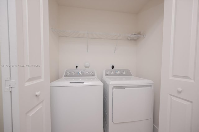 laundry area with laundry area and washing machine and dryer