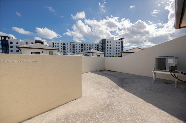 view of patio featuring cooling unit