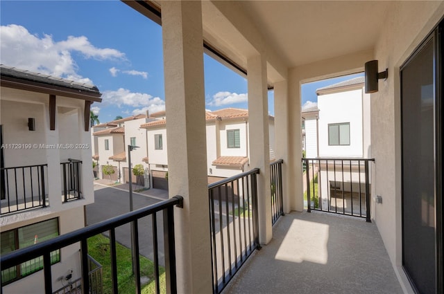 balcony featuring a residential view