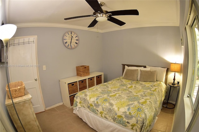 bedroom with ceiling fan, ornamental molding, and light tile patterned flooring