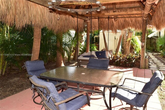 view of patio / terrace featuring a pergola