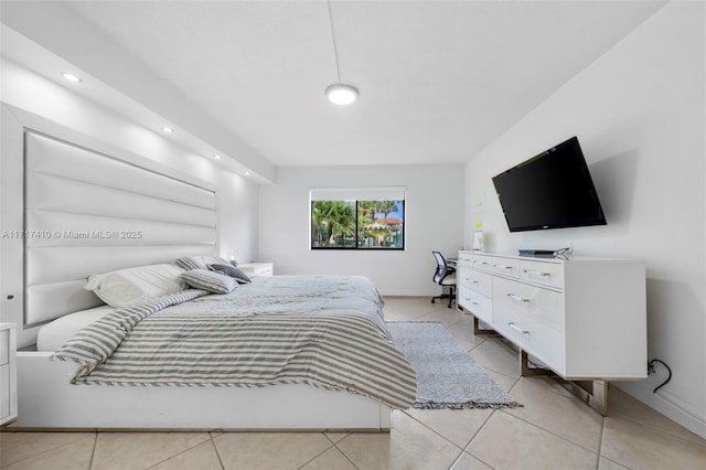 bedroom with light tile patterned flooring