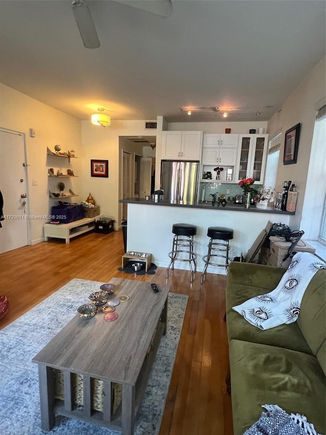 living room with wood-type flooring