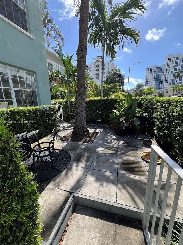1523 W Ave Unit 101, Miami Beach, FL 33139 - view of patio / terrace with a city view