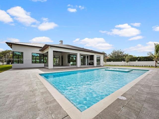 view of pool featuring a patio area