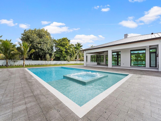 view of pool featuring a patio area