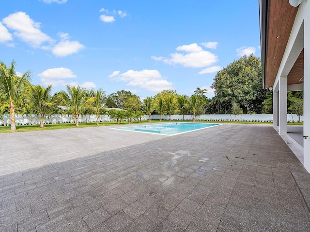 view of pool featuring a patio