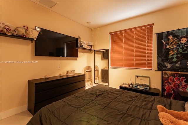 bedroom with tile patterned flooring