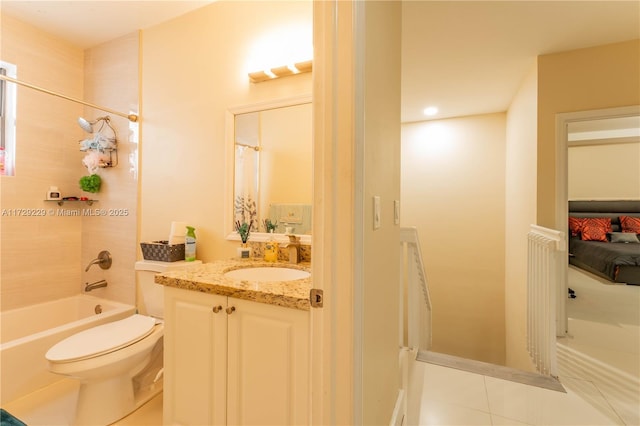 full bathroom featuring toilet, vanity, tile patterned floors, and shower / bath combo with shower curtain