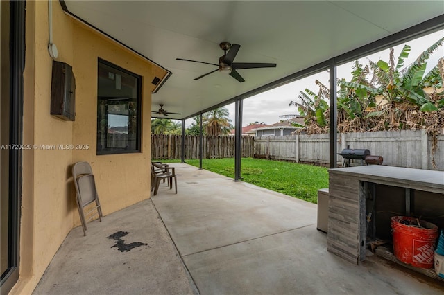 view of patio with ceiling fan