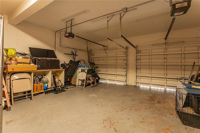 garage featuring a garage door opener