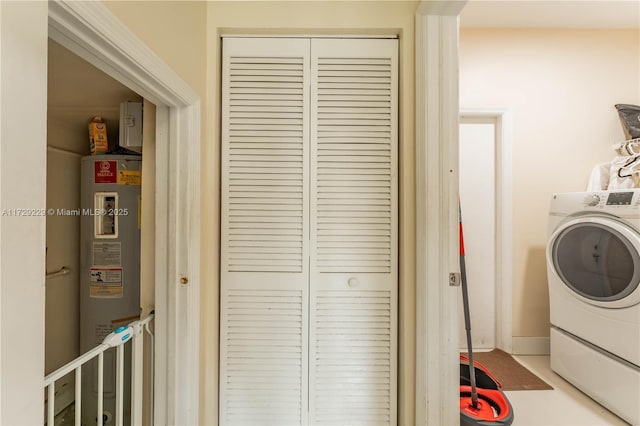 laundry area featuring washer / clothes dryer and water heater