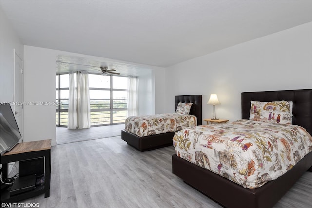 bedroom with hardwood / wood-style flooring