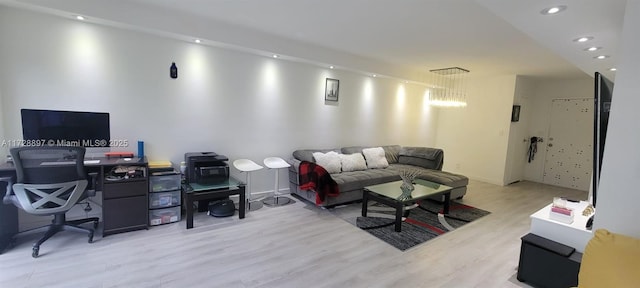 living room with light hardwood / wood-style flooring