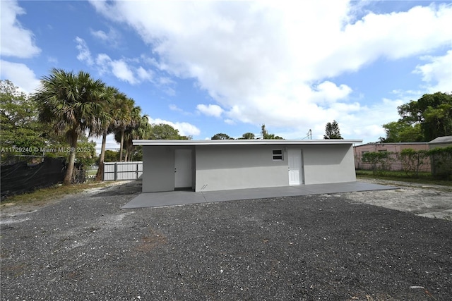 rear view of house with a patio