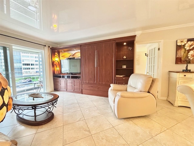 tiled living room featuring ornamental molding