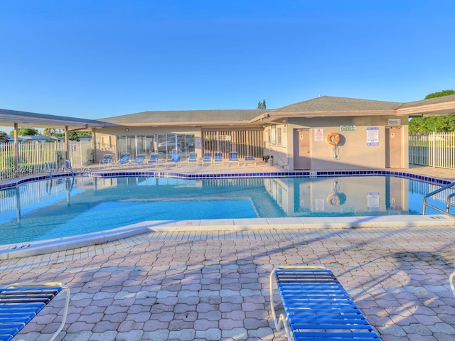 view of swimming pool featuring a patio