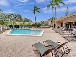 pool featuring a patio