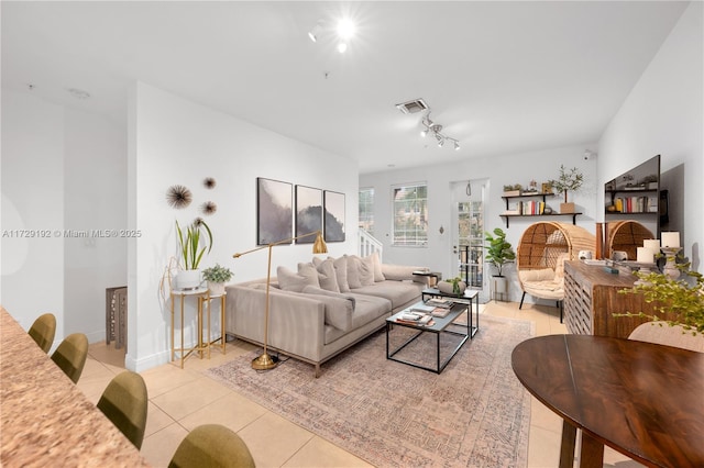 living room featuring light tile patterned floors