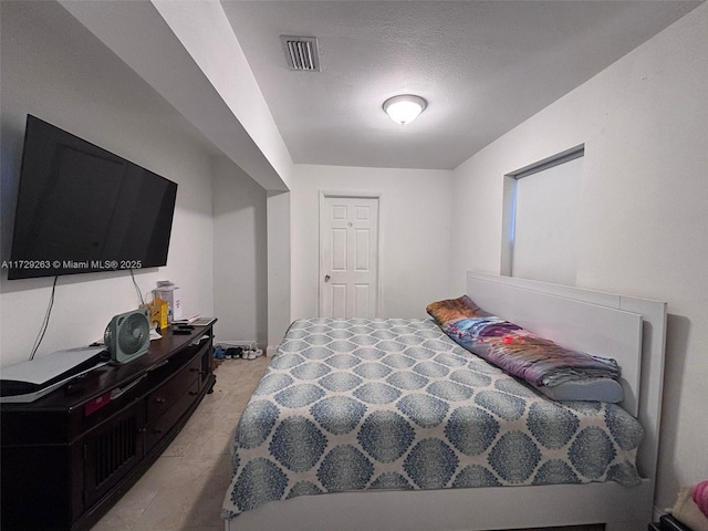 bedroom with a textured ceiling