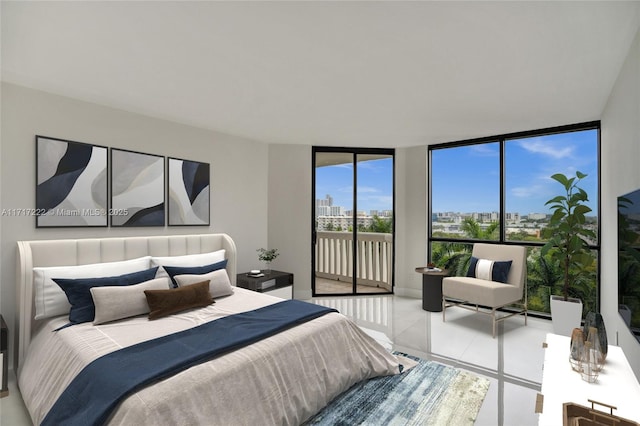 bedroom with expansive windows and access to outside