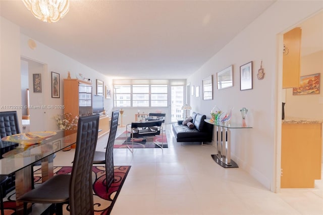 dining space with light tile patterned floors