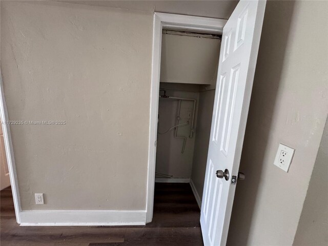 spare room with dark hardwood / wood-style flooring