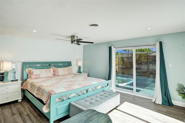 bedroom with ceiling fan, dark wood-type flooring, and access to outside