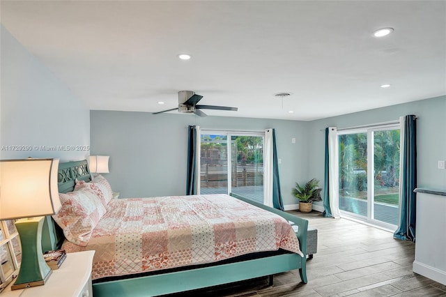 bedroom with ceiling fan, access to exterior, and multiple windows