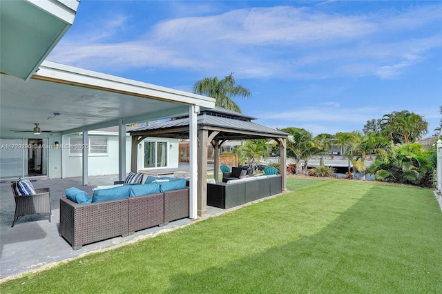 exterior space featuring an outdoor hangout area, a gazebo, and a patio area