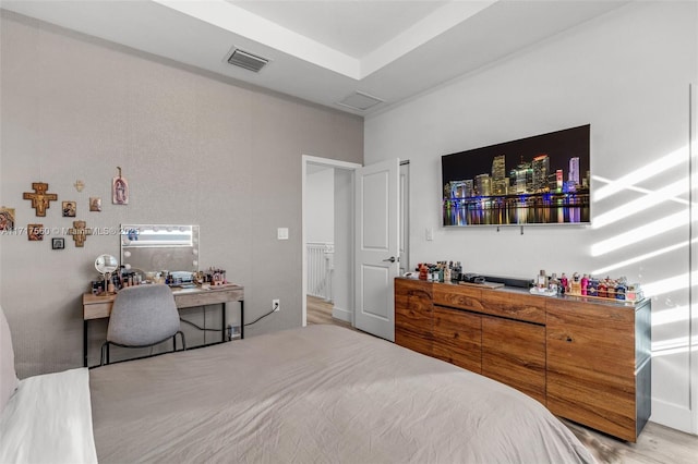 bedroom with light wood-type flooring