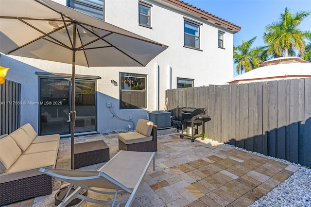 view of patio / terrace featuring an outdoor living space and area for grilling