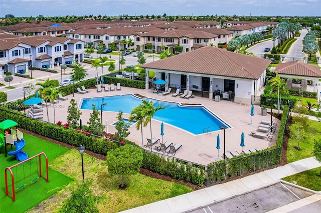 view of pool featuring a playground, a gazebo, and a patio