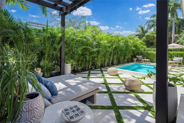 view of swimming pool with a pergola and a patio area