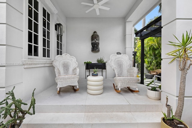 view of patio with ceiling fan