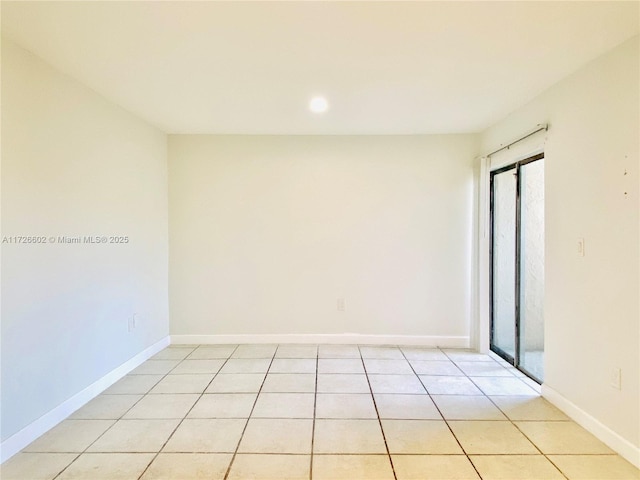 view of tiled spare room