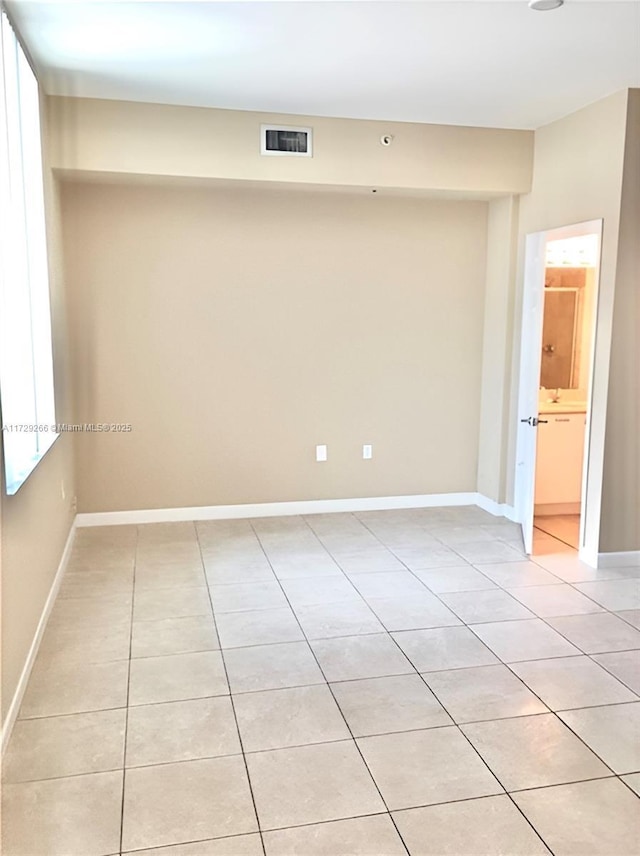 view of tiled spare room